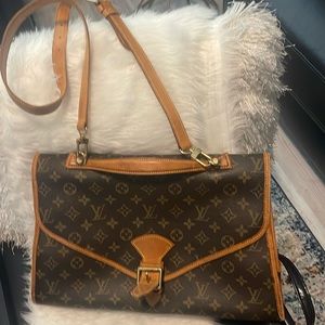 Louis Vuitton Briefcase with strap. Also can be used as a crossbody purse.